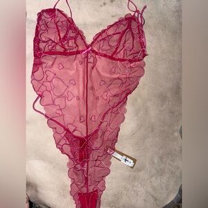 SKIMS Lace Teddy in the color Punch